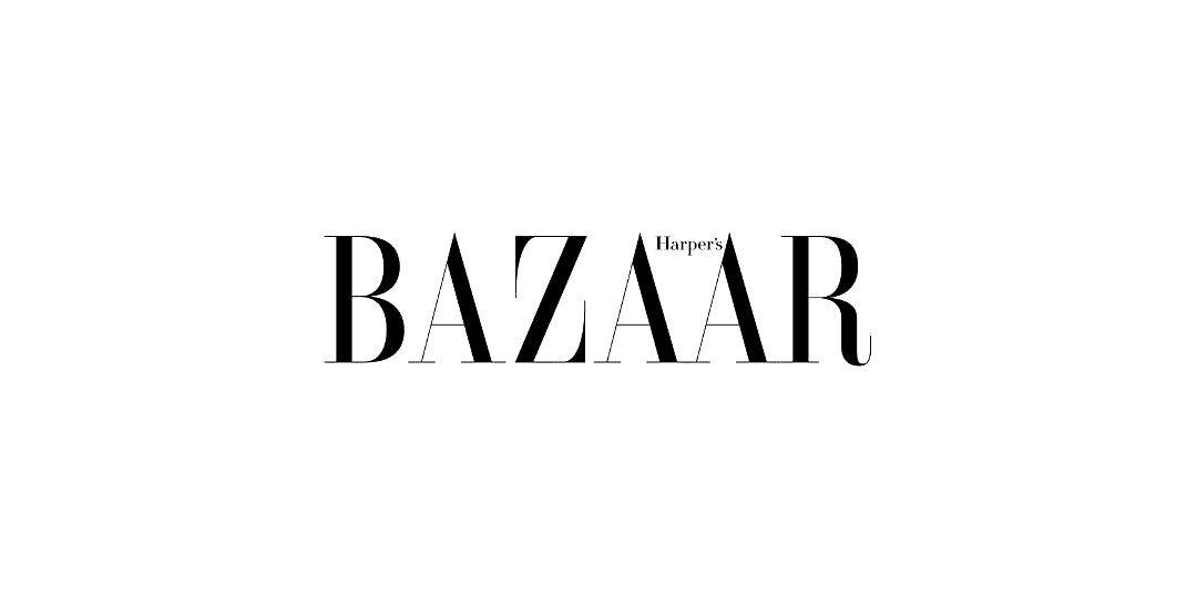 Logo of Harper's Bazaar with bold black letters on a transparent background.